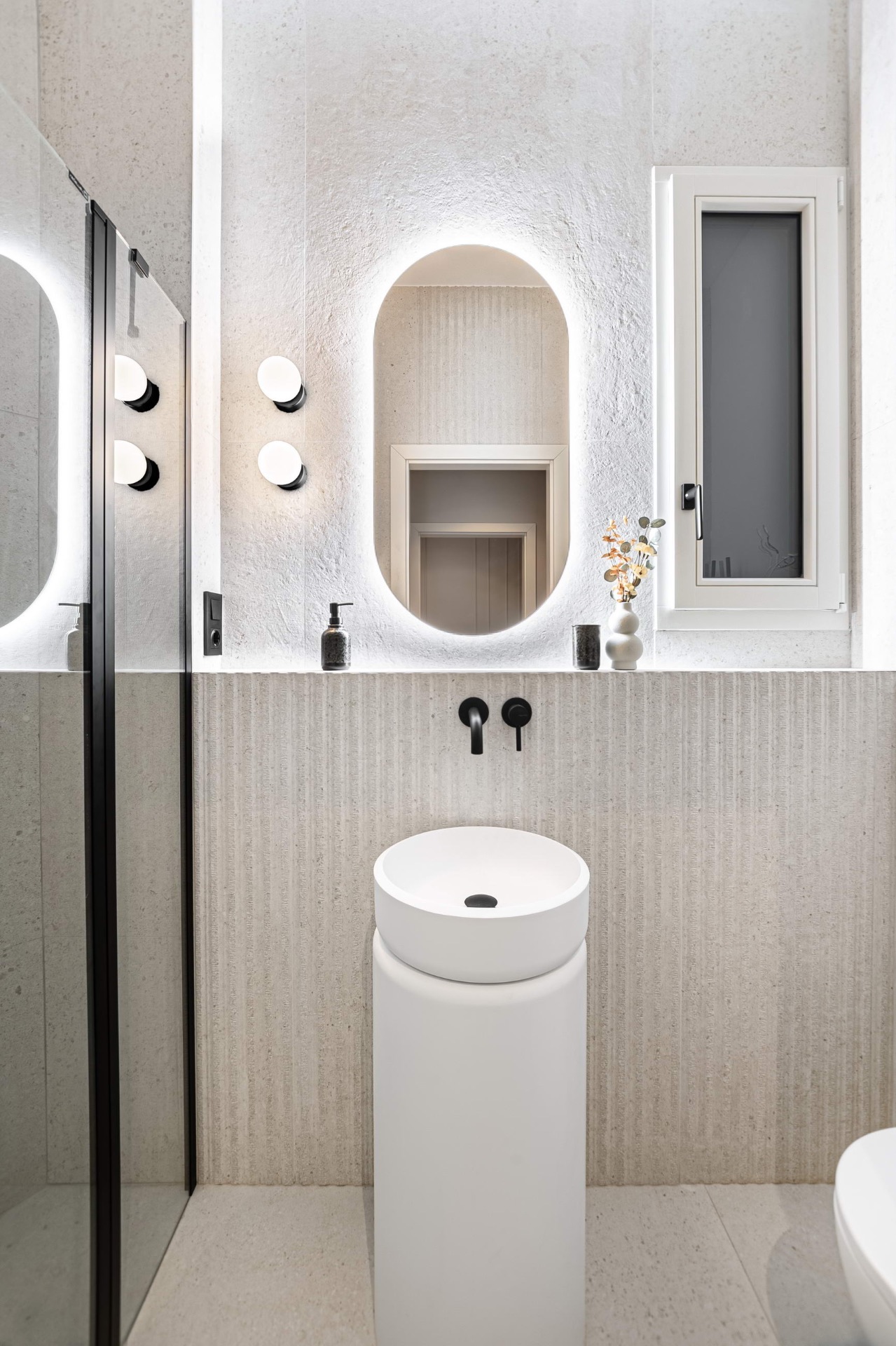 Master bath — oval basin and soft light