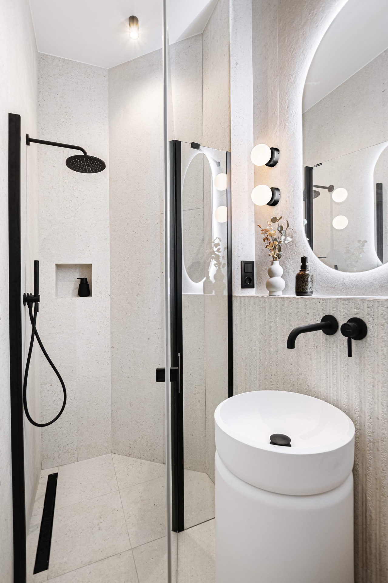 Walk-in shower with matte black fittings